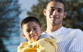 Foreman family law in Bryan, Texas - A picture of a happy Father and Son